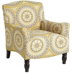 a yellow and white chair with an intricate pattern on it