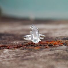 a close up of a ring on a wooden surface