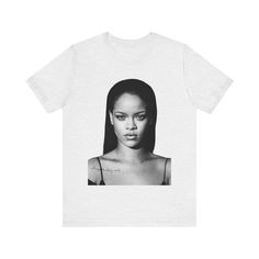 a white t - shirt with an image of a woman's face on it