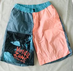 "Catch a wave with these 90's Vintage Swim trunks! Made in the USA, 100% cotton. Button and zip closure with an adjustable waist tie inside. Side pockets! Modeled on a small, size can be adjusted. (Full/unadjusted)Waist: 30\" Hip: 45\" Length: 42\"" Casual Surfing Shorts With Pockets, Retro Surfing Bottoms For Summer, Summer Cotton Surfing Bottoms, Cotton Bottoms For Surfing In Summer, Summer Surfing Cotton Bottoms, Beach Shorts With Adjustable Waist In Cotton, Pink Casual Surfing Shorts, Cotton Beach Shorts With Adjustable Waist, Cotton Beachwear Bottoms For Surfing