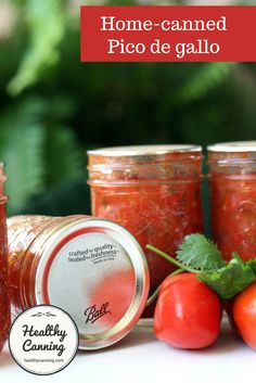 some tomatoes and other food items are sitting on a table with the words home - canned pico de galloo