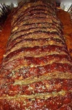 the meatloaf is covered with marinara sauce