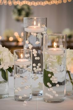 Floating pearl and hydrangea centerpiece with candles. After Party Decorations Wedding Ideas, Floating Candles With Pearls, Pearls Centerpiece Ideas, Rustic Pearl Wedding Decor, Pearl Wedding Decorations Receptions, Wedding With Pearls Decor, Waterbeads Centerpiece Wedding, Floating Centerpieces Wedding