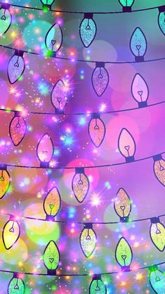 colorful lights are hanging from strings in the dark night sky, with stars and sparkles all around them