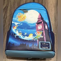 Brand New With Tags Disney Loungefly Backpack Thme: Peter Pan Size: 11” X 9.5” X 5” Color: Blue Disney Loungefly Backpack, Rare Disney Pins, Sisters Movie, Toy Story Slinky, Loungefly Backpack, Rainbow Badge, Disney 50th Anniversary, Disney Souvenirs, Disney Loungefly