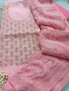 Item Overview ATHARVA Hand Embroidered Salwar Kameez w/Embroidered Neck in Pink/Full Embroidered Georgette Dupatta/Custom Stitching/Wedding/Bridal/ Dno. CH1451 Fabric: * Shirt Chanderi Silk 2.5 Mts, Pink- Embroidered Neck * Dupatta: Georgette Embroidered Dupatta-Hot Pink 2.5 Mts * Bottom Santoon Silk 2.5 Mts. Excusive Hand Embroidered Party Wear Punjabi Suit. Customization: * Fabrics Customization: Designs Can be made in different Fabrics. * Color Customization: Designs Can be made in different Wedding Embroidered Georgette Anarkali Set, Embroidered Georgette Anarkali Set For Wedding, Wedding Embroidered Jamawar Sharara, Pink Unstitched Suit For Eid Wedding, Pink Raw Silk Unstitched Suit With Resham Embroidery, Unstitched Zari Work Suit For Wedding, Embroidered Chinon Kurta For Wedding, Festive Wedding Unstitched Chinon Suit, Festive Chinon Unstitched Suit For Wedding