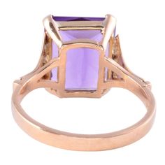 This is part of Chairish’s Fine Jewelry assortment.  Vintage retro approximately 7.50 carats amethyst ring, circa 1940. This 18 karat retro square cut amethyst ring is size 9.5.  Exact dimensions for this item are unknown.  Please reference the measurements noted in the description above for the best approximate dimensions. Please reach out to the seller under "Ask the Seller" for specific questions regarding the measurements.  *Resizing available for additional charge. Elegant Rectangular Amethyst Ring For Formal Occasions, Classic Amethyst Ring With Rectangular Stone For Formal Occasions, Elegant Amethyst Ring With Rectangular Stone For Formal Occasion, Elegant Formal Amethyst Ring With Rectangular Stone, Luxury Purple Amethyst Ring, Rectangular Shape, Luxury Purple Amethyst Rectangular Ring, Luxury Purple Rectangular Amethyst Ring, Rectangular Amethyst Ring For Formal Events, Rectangular Amethyst Ring For Formal Occasions