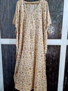 Indian Floral Cotton Kaftan dress Summer Dress Beach wear caftan Hospital Gown Material -Cotton Size- One size US Women's Letter Bust-40 inch Arm -16-18 V-neck Lengths -50 No pockets Flat measurements * One size fits most up to size US 2xl-3xl * Hangs loose and away from the body *Length can be versatile as knee length, mid calf length, ankle Length and Floor length depending on your style * Individual hand tie dye with one of kind pattern * each item will vary slightly from the photo This cafta Bohemian Maxi Dress With Dabka, Bohemian Floor-length Gown For Eid, Flowy Floor-length Beach Gown, Bohemian Multicolor Gown For Eid, Festive Floor-length Maxi Dress For Beach, Beige Tunic Kaftan For Eid, Summer Anarkali Style Maxi Kaftan, Summer Anarkali Maxi Kaftan, Summer Maxi Dress With Dabka Detail