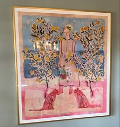 a painting hanging on the wall in a room