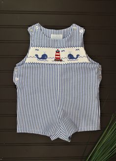 Sweet summer romper for the tiny water lovers in your life. Perfect as is or paired with a shirt underneath. 65% Polyester - 35% Cotton Machine wash Summer Gingham Cotton Bubble Romper, Casual Blue Short Sleeve Bubble Romper, Casual Cotton Bubble Romper For Summer, Casual Cotton Bubble Romper With Short Sleeves, Casual Short Sleeve Cotton Bubble Romper, Fun Cotton Bubble Romper For Summer, Summer Fun Cotton Bubble Romper, Playful Short Sleeve Bubble Romper For The Beach, Playful Short Sleeve Bubble Romper For Beach