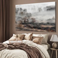 a bedroom with a large painting on the wall above the bed, and a lamp next to it