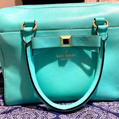 I’m Good Condition Comes With Strap. Color Is A Tiffany Blue. Turquoise Crossbody Shoulder Bag With Detachable Strap, Turquoise Crossbody Bag With Detachable Strap, Kate Spade Green Bag With Detachable Handle, Kate Spade Green Bag With Adjustable Strap, Green Kate Spade Bag With Adjustable Strap, Kate Spade Green Rectangular Shoulder Bag, Turquoise Top Handle Shoulder Bag For Travel, Kate Spade Light Blue Bag For Shopping, Green Kate Spade Shoulder Bag For Travel