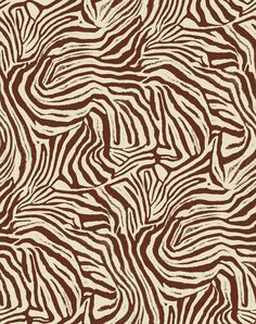 a brown and white zebra print pattern with wavy lines on the back side of it