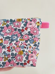 "100% Cotton. Lightweight. From the world famous Liberty Fabrics with a silk-like touch, unique print quality and striking color vibrancy. This mini pouch is great size for a couple of small items. Size is 4\"W / 3\"H / 1.5\"D (10cm / 8cm / 3.5cm) Flat bottom shape. Fabric is Liberty of London Tana Lawn. The pouch opens with golden color zipper.(High quality YKK zipper) It comes with a velvet ribbon on one side.(color is pink) Lined inside with pretty baby-pink color cotton. Please, Hand wash. O Pink Pouch Cosmetic Bag As Gift, Pink Fabric Bag As A Gift, Pink Fabric Bag As Gift, Pink Fabric Bag For Gift, Multicolor Cosmetic Bag For Daily Use In Spring, Pink Floral Print Bag For Gift, Spring Multicolor Pouch, Cute Multicolor Cosmetic Bag With Zipper Pouch, Handmade Pink Pencil Case Pouch