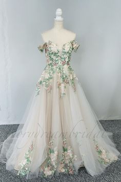 a dress with flowers and leaves on it