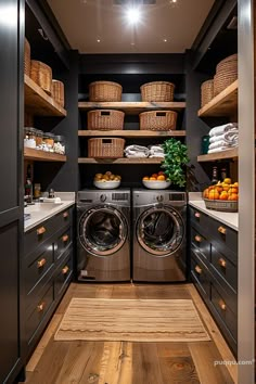 a washer and dryer in a room with open shelves on the wall next to each other