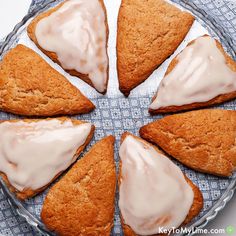 there are seven cookies with icing on the plate