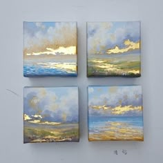 four paintings are hanging on the wall in three different styles, each with gold and blue colors