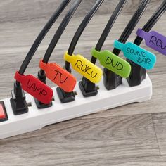 four different colored cords with the words sound bar on them