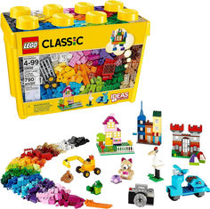 a yellow lego case filled with lots of different colored blocks and toys on top of a white background