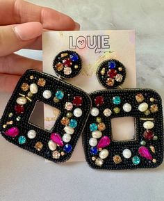 Louie Love Exclusive Handmade beaded Black & Colorful Rhinestone Earrings Handmade beaded so beadwork may vary slightly **More trendy accessories & earrings available at shoplouielove.com Multicolor Beaded Crystal Earrings For Party, Dangle Beaded Earrings With Rhinestones As Gift, Party Black Beaded Round Earrings, Party Crystal Earrings With Beaded Round Beads, Party Crystal Earrings With Beaded Design, Party Crystal Beaded Earrings, Multicolor Beaded Earrings With Black Beads For Party, Bohemian Embellished Beaded Earrings For Party, Multicolor Crystal Beaded Earrings