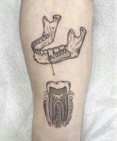 a black and white photo of a tattoo with an image of a toothbrush and dental structure