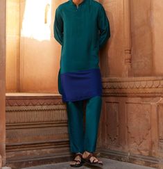 "Hey guys! Searching for a stylish and comfortable outfit? Check out our Silk Block Long Men Kurta! It's the perfect blend of stylishness and comfort. Get ready to turn heads with this trendy kurta! ⦿Size: ⦿Size Guide | Calculate Size  ✪XSSMLXL2XL ✪LENGTH KURTA 42\" Silk Blend Long kurta with color paneling. It is regular fit with full sleeve. The product has 2 pockets. The product does not have lining. Dry clean only. ✪ Checkout other Products -https://classicsaree.etsy.com/in-en/listing/1634155976/bright-chinoon-printed-lehenga-floral ◙ Note: If you have any questions or concerns, feel free to contact us over Etsy Connect ( Message ) ⚫ Follow Us for Exclusive Updates and Share Your Feedback by Rating Our Etsy Shop :- classicsaree.etsy.com Why Choose Us ? ✅ Quality Assurance ✅ Exquisite C Formal Blue Silk Kurta, Blue Art Silk Kurta With Long Sleeves, Blue Long Sleeve Art Silk Kurta, Green Traditional Kurta For Semi-formal Occasions, Blue Traditional Wear For Semi-formal Eid, Blue Semi-formal Traditional Wear For Eid, Blue Art Silk Sets With Long Sleeves, Green Semi-formal Festive Kurta, Blue Semi-formal Traditional Wear For Diwali