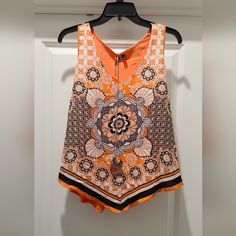 Women's Sleeves Shirt Never Worn Size Xl Orange Vest Top For Spring, Orange Sleeveless Top For Spring, Orange Sleeveless Blouse For Summer, Orange Sleeveless Vest For Summer, Summer Orange Sleeveless Blouse, Orange Summer Vest, Orange Sleeveless Summer Vest, Orange Tank Top For Beach, Orange Printed Sleeveless Top