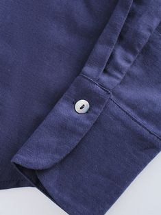 Introducing our Linen Blouse-Navy. Perfect for both casual and formal occasions, this blouse provides a sophisticated and polished look. Classic Button-up Blouse With Welt Pockets, Formal Shirt With Pockets And Lapel Collar, Navy Cotton Blouse For Fall, Navy Elegant Tops For Formal Occasions, Navy Elegant Formal Tops, Navy Elegant Formal Shirt, Elegant Navy Formal Shirt, Formal Navy Shirt With Button Closure, Navy Buttoned Tops For Fall