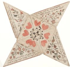 an origami star with hearts and flowers on the inside is decorated with writing