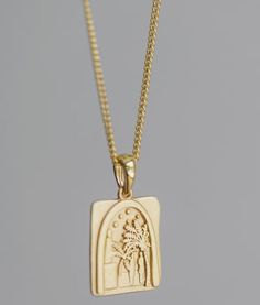 This beautiful gold vermeil pendant is crafted with 18k gold and features an intricate palm tree design. Gold Rectangular Pendant With Etched Details, Gold Etched Rectangular Pendant Jewelry, Gold Etched Pendant Necklace, Luxury Etched Pendant Necklaces, Luxury Gold Etched Necklace, Palm Tree Design, Pencil Artwork, Colored Pencil Artwork, Tree Design