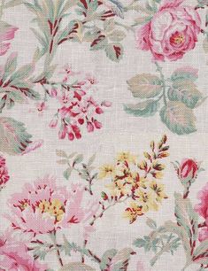 a floral print fabric with pink and yellow flowers