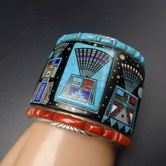 Navajo ERVIN TSOSIE Turquoise Coral MICRO INLAY YEI Cuff BRACELET SterlingSilver | eBay Multicolor Cuff Jewelry For Gifts, Southwestern Blue Cuff Bracelet As Gift, Southwestern Style Multicolor Bracelet, Southwestern Style Multicolor Bracelet Jewelry, Southwestern Blue Cuff Jewelry, Collectible Multicolor Bangle, Bohemian Blue Bracelets With Inlay, Southwestern Multicolor Cuff Bangle, Artisan Blue Bracelets Collectible