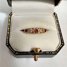 This Is A Vintage 18k Yellow Gold Diamond And Ruby Five-Stone Anniversary Ring. Hallmarked (Pictured) For 750, Or 18k Gold. Size 4 3/4 (4 And 3/4). A Beautifully Preserved Vintage Heirloom Piece! Exquisite Yellow Gold Ruby Ring, Gold Ruby Ring With Rose Cut Diamonds, Elegant Gold Ruby Ring With Rose Cut Diamonds, Luxury Hallmarked Yellow Gold Ruby Ring, Luxury Yellow Gold Ruby Ring Hallmarked, Luxury Multi-stone Ruby Ring In Gold, Luxury Gold Ruby Ring With Multi-stone, Luxury Multi-stone Gold Ruby Ring, Exquisite Gold Ruby Gemstone Ring