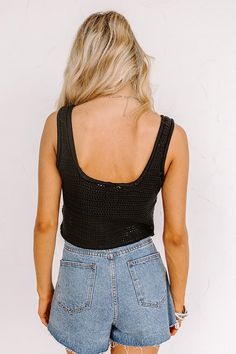 Keep cool all summer long in our trendy black 'Beach Daydream' top featuring ultra lightweight loose knit material, a scooped neckline, 1-inch shoulder straps, and a flattering silhouette that ends in a straight cropped hemline! For additional coverage, we recommend styling over your fave bralette! Measurements S : Bust 32", Length 16", Waist 30". M : Bust 34", Length 17", Waist 32". L : Bust 36", Length 18", Waist 34". Black Crop Top Tank Top For Beach, Knit Scoop Neck Crop Top, Trendy Scoop Neck Tank Top For Beach, Trendy Scoop Neck Tank Top For The Beach, Black Open Knit Crop Top For Spring, Black Summer Crochet Top For Beach, Black Crochet Summer Top For Beach, Black Knit Tank Top For Beach, Black Stretch Tank Top For Beach