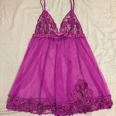 Bright Purple Baby Doll. Received As Gift, Washed But Never Worn. Has Couple Of Tiny Speckled Snags From Storing Over Time That Are Not Noticeable Unless Examined Very Closely Purple Lace Sleepwear With Lace Trim, Purple Lace Sleepwear For Loungewear, Purple Sheer Sleeveless Sleepwear, Purple Lace Sleepwear, Purple Lace Fitted Sleepwear, Fitted Purple Lace Sleepwear, Purple Lace Trim Party Sleepwear, Fitted Sheer Purple Sleepwear, Sequin Bra Top