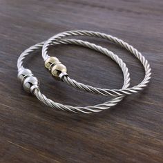 The Cape Cod Double Ball Bracelet available in sterling silver and 14k gold. Compass Rose Necklace, Cape Cod Bracelet, Silver Cape, Cape Cod Jewelry, Twist Bracelet, Hook Bracelet, Twisted Bracelet, Gold Bangles Design, Ball Bracelet