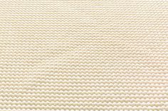 an up close view of a white fabric texture