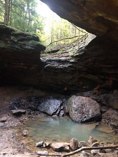 there is a small pool in the middle of this cave