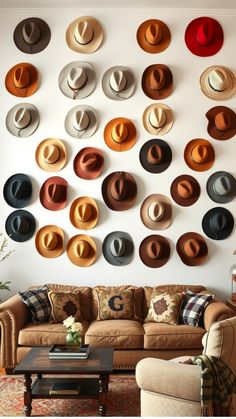 A collection of colorful hats arranged on a wall above a cozy sofa with patterned cushions. Cowboy Living Room, Vintage Western Decor, Cowhide Rugs, Leather Sofas, Modern Elements, Decor Pieces, Inspired Living, Cow Hide Rug, Western Decor