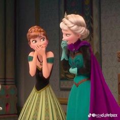 two frozen princesses standing next to each other with their hands on their mouths and looking at each other