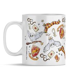 harry potter mug with hogwarts and symbols on it