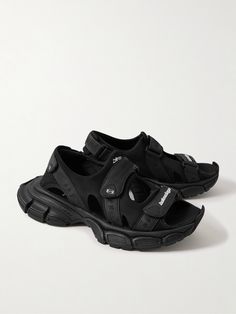 Balenciaga’s '3XL' sandals are modelled after the distressed sneakers of the same name. Designed with cutouts for breathability, they're made with comfortable scuba uppers, faux leather and canvas trims and have a trio of VELCRO®-fastening straps to adjust the fit. Casual Open Toe Sport Sandals With Rubber Waffle Outsoles, Summer Streetwear Sneakers With Vibram Sole, Leather Slip-on Sport Sandals For Streetwear, Leather Slip-on Sandals For Streetwear, Sporty Summer Sport Sandals With Vibram Sole, Leather Sneakers With Vibram Sole For Summer, Summer Leather Sneakers With Vibram Sole, Summer Streetwear Sandals With Rubber Waffle Outsoles, Streetwear Sport Sandals With Rubber Sole And Open Toe