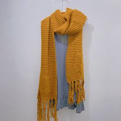 super long Soft Knit scarf with pocket soft chunky knit circle endless loop long circular mustard yellow scarf cabled scarf fall winter scarf Knit Infinity Scarf keeps you stylish and warm, made from a thick knit fabrication with an infinity design that won't come undone even in harsh winds. Cool weather, cooler threads. One size. 100% Acrylic Dimensions: 110" x 13" Yellow Winter Scarf, One Size, Yellow Winter Scarf One Size, Casual Yellow Scarf For Winter, Casual Yellow Winter Scarf, Cable Scarf, Infinity Design, Yellow Scarf, Come Undone, Fall Scarves