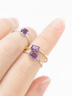 A unique spin on a modern classic. The Lady's Mantle Amethyst ring stuns with an amethyst center stone of a rich purple. It's a great present for those born in the month of love, February. Modern Purple Amethyst Ring For Anniversary, Modern Purple Amethyst Rings, Lavender Amethyst Ring In 14k Gold As Gift, 14k Gold Purple Solitaire Ring, 14k Gold Amethyst Ring With Lavender Gemstone, 14k Gold Lavender Amethyst Ring, 14k Gold Amethyst Ring For Birthstone, Purple Amethyst Birthstone Ring In 14k Gold, Purple Birthstone Ring In 14k Gold