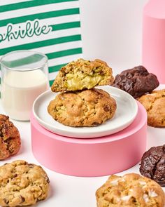 chocolate chip cookies and milk on a pink plate