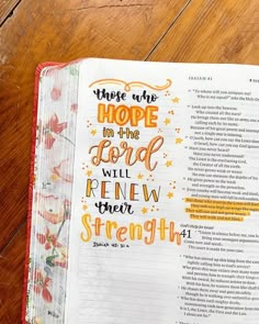 an open bible with the words, hope in the lord will renew strength on it