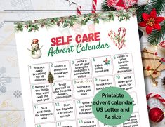 a printable self care calendar with christmas decorations and candy canes on the table