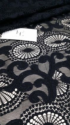 "Black color lace fabric. Sides are not scalloped. Width: 150 cm/59.1 inches Item number: LJ89421 www.LaceToLove.com Price is set for one meter/yard. You will receive the fabric in one continuous piece if you purchase more than 1 meter/yard. Actual color may vary greatly form the color you see on screen. It depends on your devices screen brightness/settings. We recommend you to buy a sample before ordering to see the true color. You can purchase a sample here: https://www.etsy.com/listing/248526 Black Lace Fabric, Lace Evening Dress, Dress Tops, Lace Bands, Alencon Lace, Lace Veils, Lace Bridal Gown, Wedding Lace, Embroidery Floral