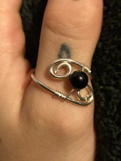 Spiral wire ring with one onyx bead Elegant Onyx Wire Wrapped Jewelry, Adjustable Wire Wrapped Open Ring, Adjustable Wire Wrapped Metal Ring, Adjustable Spiritual Wire Wrapped Crystal Ring, Bohemian Spiral Wire Wrapped Rings, Wire Rings, Onyx Bead, Band Rings, Onyx